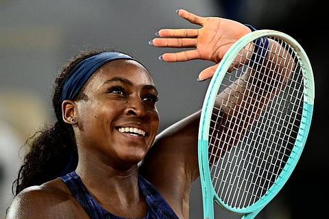 US Coco Gauff celebrates after winning the match against France's Lois Boisson in the women's singles semifinal of the French Open tennis at the Roland-Garros Complex in Paris on June 5, 2025.