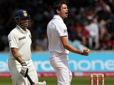 England's James Anderson (right) celebrates after dismissing Sachin Tendulkar at Lord's on July 25, 2011.