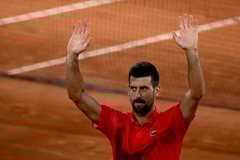 Serbia's Novak Djokovic waves to the crowd after losing his men's singles semi-final against Italy's Jannik Sinner in French Open on Friday.