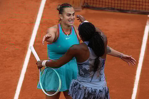 US Coco Gauff (front) embraces Belarus' Aryna Sabalenka after defeating her in their women's singles final match on day 14 of the French Open tennis tournament on Court Philippe-Chatrier at the Roland-Garros Complex in Paris on June 7.