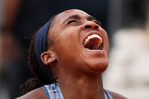 America's Coco Gauff celebrates after winning her women's singles final against Belarus' Aryna Sabalenka at the French Open tennis tournament on Court Philippe-Chatrier at the Roland-Garros Complex in Paris on June 7, 2025.