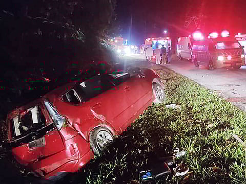 This handout photo taken and released by Perak's Fire and Rescue Department on June 9, 2025 shows a minivan after it collided with a bus in Gerik-Jeli, in Malaysia's Perak state.