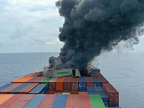 Singapore-flagged container vessel Wan Hai 503 catches fire in the sea off the Kannur coast in north Kerala, on Monday.