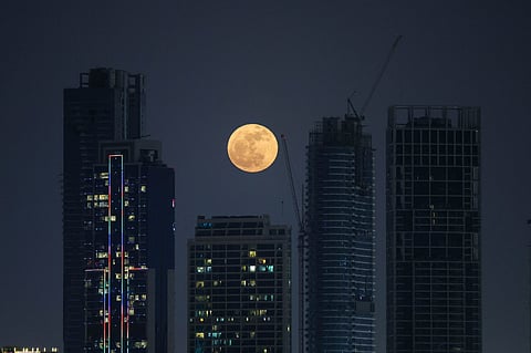 Strawberry Moon as seen from Palm Jumeirah in Dubai on Wednesday.