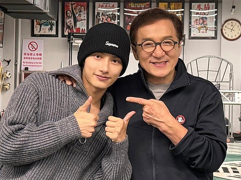 Jun and Jackie Chan on the sets of their movie, 'The Shadow's Edge'