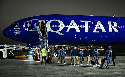 FC Paris Saint-Germain (PSG) players walk on the tarmac after landing at Los Angeles International Airport (LAX) on June 10.