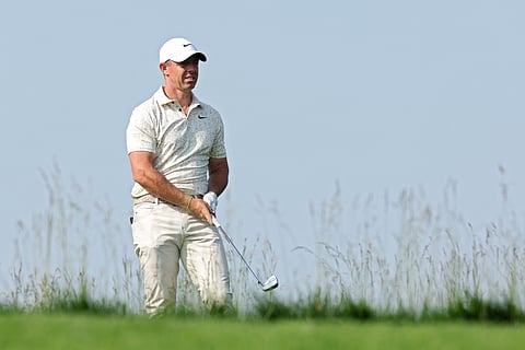 Rory McIlroy of Northern Ireland watches his shot on the 15th hole during the first round of the 125th US Open at Oakmont Country Club.