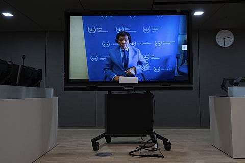Former Philippine president Rodrigo Duterte seen on a screen in the courtroom during his first appearance before the International Criminal Court on charge of crimes against humanity over his deadly crackdown on narcotics, in The Hague