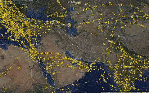 A view of Iranian airspace as of early Friday, 13 June. Flight Radar 24's 'Airways' overlay shows some of the alternate routings aircraft are taking to the north and south of Iraqi airspace.