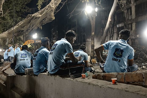 First aid responders on duty at the crash site of the doomed Air India flight in Ahmedabad, India.