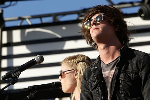 Musicians Hannah Reid (L) and Dominic "Dot" Major, of London Grammar, perform onstage at the 2014 mtvU Woodie Awards and Festival on March 13, 2014 in Austin, Texas.
