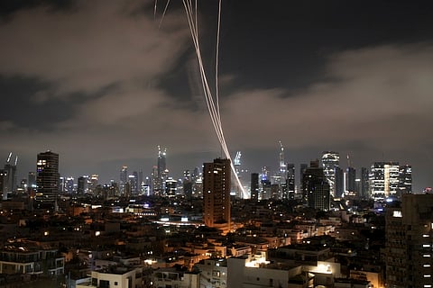 Israeli Iron Dome air defense system fires to intercept missiles over Tel Aviv, Israel.