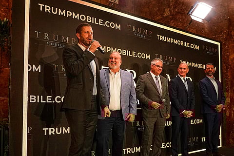 Eric Trump, Don Hendrickson, Eric Thomas, Patrick O'Brien and Donald Trump Jr., left to right, participate in the announcement of Trump Mobile, in New York's Trump Tower, Monday, June 16, 2025.