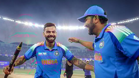 Skipper Rohit Sharma (right) and Virat Kohli celebrate the Champions Trophy triumph in Dubai. The duo's ODI future has been the subject of speculation over the past weeks.
