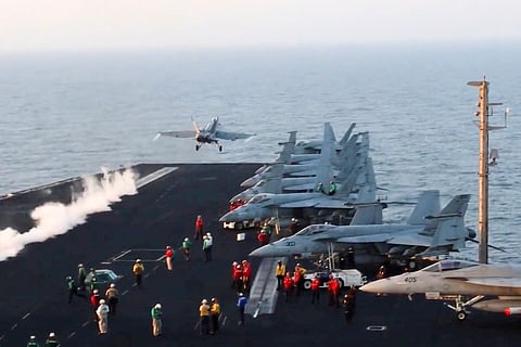 This image taken from video provided by the U.S. Navy shows an aircraft launching from the USS Harry S. Truman in the Red Sea before airstrikes in Sanaa, Yemen, March 15, 2025.