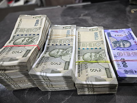 The India rupee has firmed up quite a bit early Tuesday against the dollar - will it spoil NRIs' remittance plans with their June salaries?