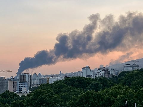 Smoke rises from the building of Iran's state-run television after an Israeli strike in Tehran, Iran, Monday, June 16, 2025.
