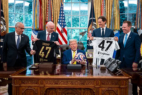US President Donald Trump makes remarks as he meets with members of the Juventus Football Club team during a press availability in the Oval Office at the White House on June 18, 2025 in Washington, DC. The US is hosting the FIFA Club World Cup, an international soccer tournament organised by FIFA featuring club teams from around the world.