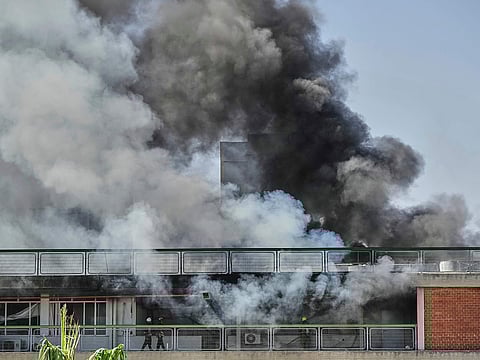 Firefighters work in a building of the Soroka hospital complex after it was hit by a missile fired from Iran in Be'er Sheva, Israel, on Thursday, June 19, 2025.