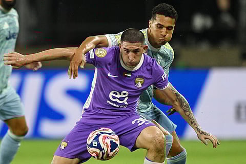 Al Ain's defender Facundo Zabala and Juventus' Alberto Costa fight for the ball during the FIFA Club World Cup 2025 Group G football match at the Audi Field stadium in Washington, DC, on June 18, 2025.