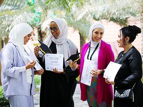Graduates of the NOMU Al Ghurair Women in AI program receive their certificates