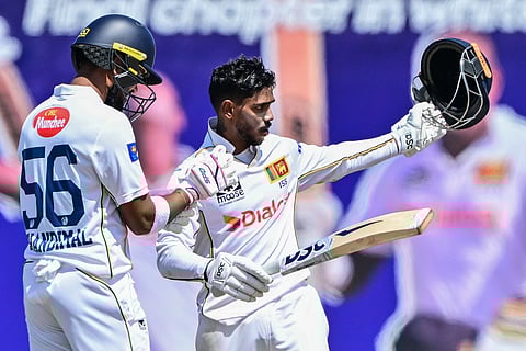 Sri Lanka's Pathum Nissanka celebrates his century during the third day of the first Test cricket match between Sri Lanka and Bangladesh at the Galle International Cricket Stadium in Galle on June 19, 2025.