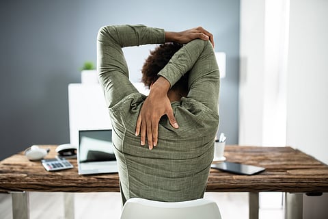Unlocking workplace wellness: 8 simple office yoga moves to fix your back pain