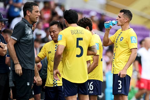 Adam Mitchell #3 of Auckland City FC takes a hydration break during the FIFA Club World Cup 2025 group C match between SL Benfica and Auckland City FC at Inter&Co Stadium on June 20, 2025 in Orlando, Florida.
