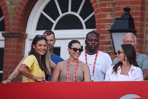 Britain's tennis player Emma Raducanu (left) reacts as Spain's Carlos Alcaraz wins against Spain's Roberto Bautista-Agut during their men's singles semi-final tennis match at Queen's Club in west London on June 21, 2025.