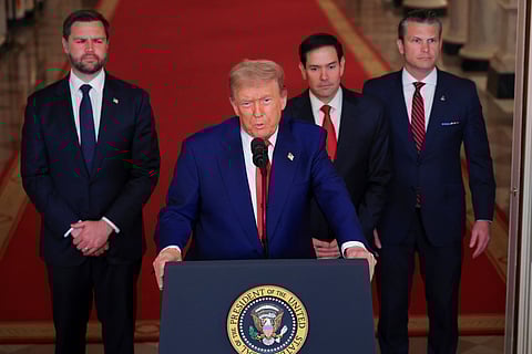 President Donald Trump speaks from the East Room of the White House in Washington.