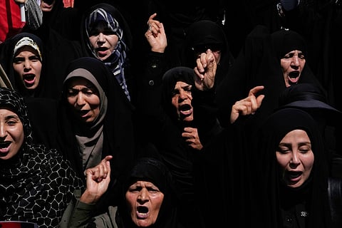 Women chant slogans during a protest to condemn Israeli attacks on multiple cities across Iran, after attending a Friday prayers ceremony in Tehran, Iran, Friday, June 20, 2025.