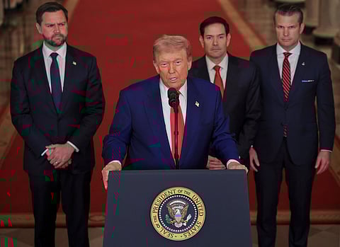 President Donald Trump speaks from the East Room of the White House in Washington.
