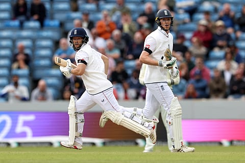 England's Ben Duckett (L) and Zak Crawley run between wickets on day five of the first cricket Test against India at Headingley cricket ground in Leeds, northern England on June 24, 2025.
