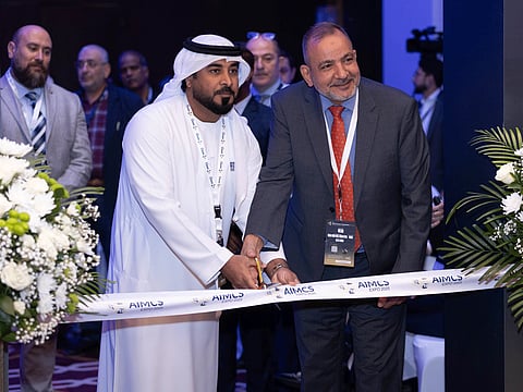 Mosleh Al Harbi and Omar El Sinnary at the AIMCS EXPO