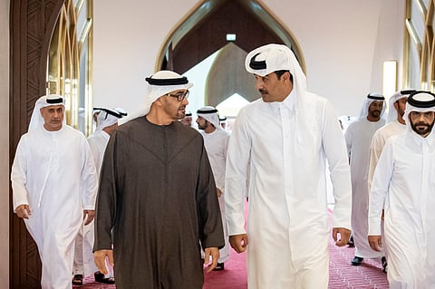 His Highness Sheikh Mohamed bin Zayed Al Nahyan, President of the United Arab Emirates (L), is received by Sheikh Tamim bin Hamad Al Thani Emir of Qatar, upon arriving at Hamad International Airport.