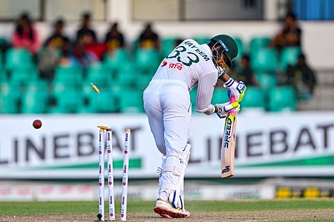 Bangladesh's Nayeem Hasan is clean bowled by Sri Lanka's Asitha Fernando during the first day of the second Test cricket match at the Sinhalese Sports Club (SSC) in Colombo on June 25, 2025.
