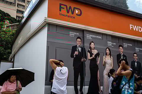 Hong Kong’s Insurance Boom Lures Job-Seeking Mainlanders