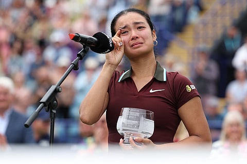 Philippines’ Alexandra Eala sheds a tear at the presentation ceremony after her defeat to Australia's Maya Joint in the women's singles tennis final of the Lexus Eastbourne Open in southern England, on June 28, 2025.