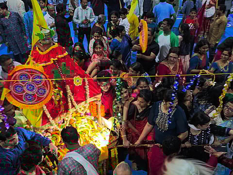 The festival drew over 1,000 attendees who enjoyed rituals, music, and cultural shows.
