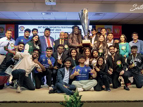 West Indian cricketing legend Chris Gayle poses with students during the 20th edition of the BPDC Sports Festival.