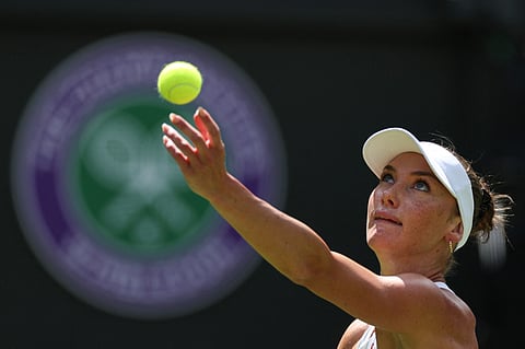 Canada's Carson Branstine serves to Belarus' Aryna Sabalenka during their women's singles first round tennis match of the 2025 Wimbledon Championships in southwest London, on June 30, 2025.