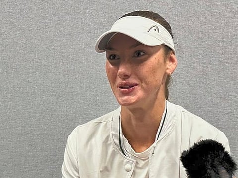 Carson Branstine, a tennis player who went to Texas A&M University and represents Canada, speaks to reporters at the All England Club in Wimbledon, London, Saturday, June 28, 2025. (AP Photo/Howard Fendrich)