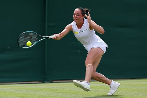 Italy's Elisabetta Cocciaretto plays a forehand return to US player Jessica Pegula during their women's singles first round tennis match on the second day of the 2025 Wimbledon Championships at The All England Lawn Tennis and Croquet Club in Wimbledon, southwest London, on July 1, 2025.