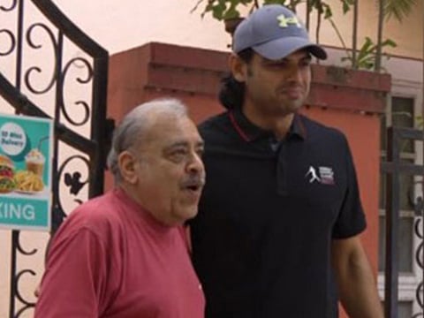 Neeraj Chopra meets an elderly fan in Bengaluru.