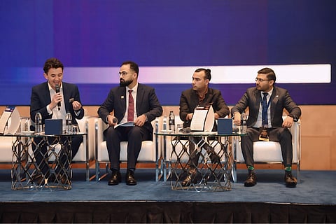 Zubair Makhdoomi, Director of Sales, Free Zones Authority of Ajman (second from left); Vishal Dixit, Head of Revenue, Shams Free Zone (middle); and Harsh Drolia, Head of Finance, Meydan Free Zone (extreme right), during a panel titled Free zones forward: Policy, innovation, and the future of investment at the UAE Growth & Investment Forum. The panel was moderated by Lachlan Kitchen
