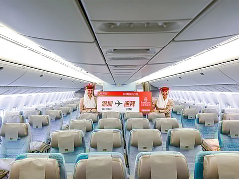 Emirates cabin crew celebrates the launch of Dubai-Shenzhen flight.