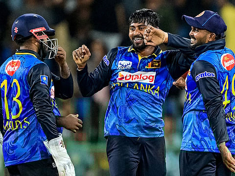 Sri Lanka's Kamindu Mendis (centre) celebrates with teammates after dismissing Bangladesh's Taskin Ahmed during the first One-Day International in Colombo on Wednesday.