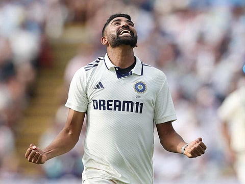 India's Mohammed Siraj celebrates after taking the wicket of England's Josh Tongue on day three of the second Test match at Edgbaston cricket ground in Birmingham, central England on July 4, 2025.