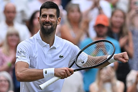 Serbia's Novak Djokovic celebrates after victory over Serbia's Miomir Kecmanovic at the end of their men's singles third round tennis match on the sixth day of the 2025 Wimbledon Championships at The All England Lawn Tennis and Croquet Club in Wimbledon, southwest London, on July 5, 2025.