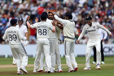 India's Akash Deep (C) is congratulated after trapping England's Harry Brook LBW (leg before wicket) on day five of the second cricket Test match at Edgbaston cricket ground in Birmingham, central England on July 6, 2025.